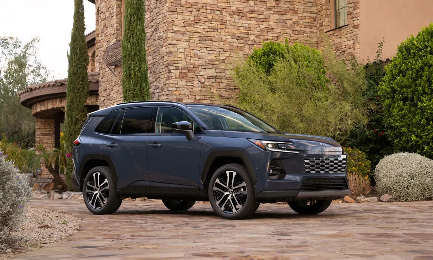 2026 Toyota RAV4 — front three-quarter view, Compact SUV · Export from China